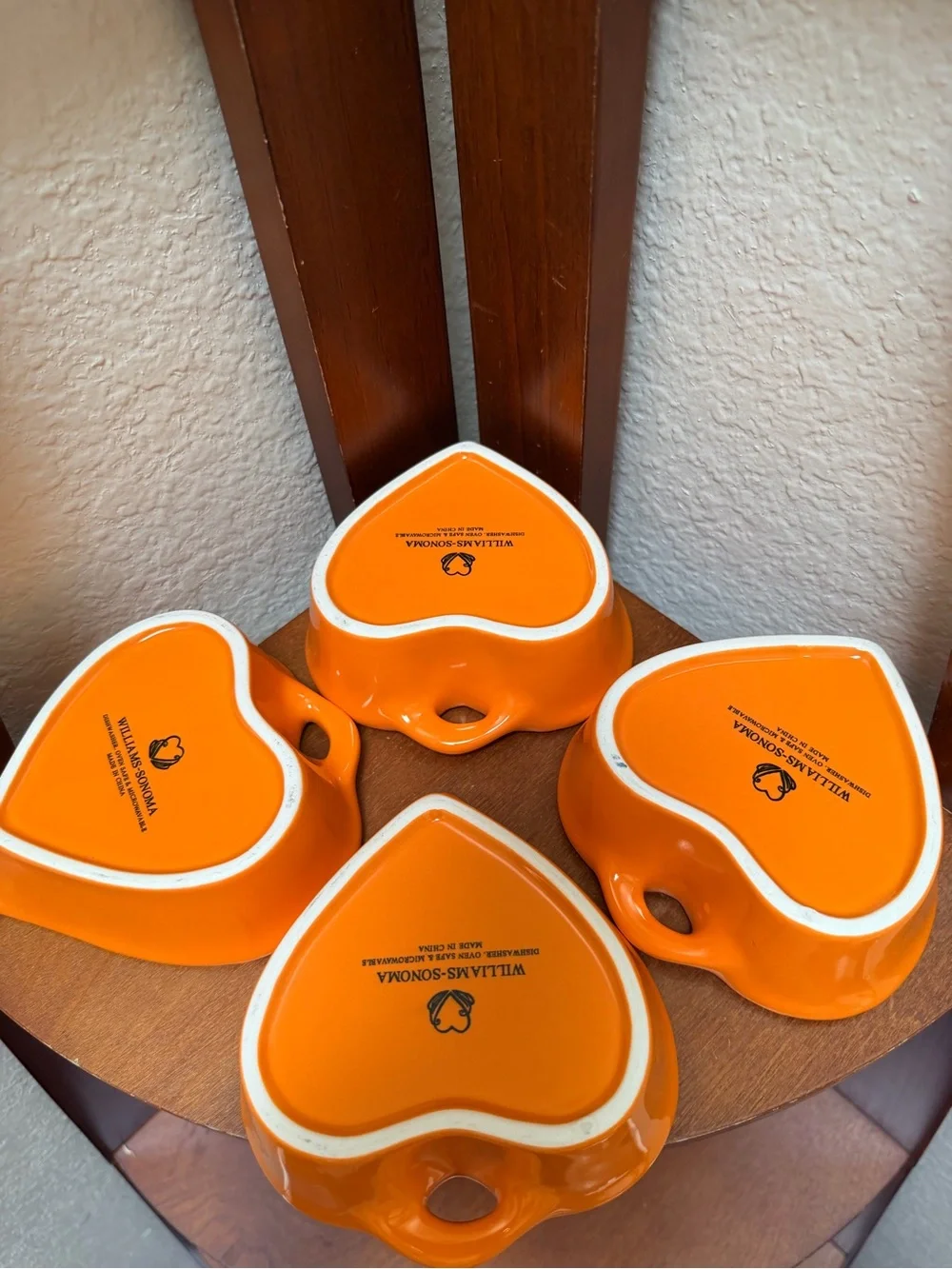 Williams-Sonoma Ceramic Heart-Shaped Dish  Set of 4 in a vibrant glossy orange.